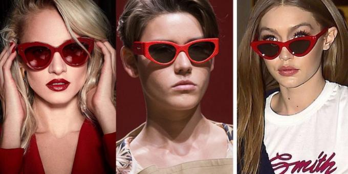 γυαλιά ηλίου των γυναικών σε ένα κόκκινο πλαίσιο